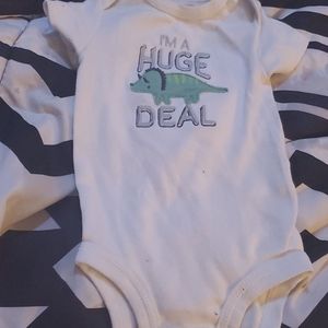 Baby boy Dino onesie never worn